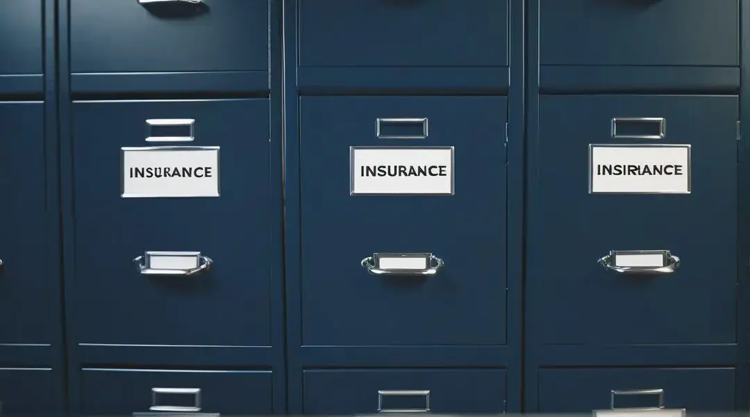Row of blue metal filing cabinets labeled 'INSURANCE'